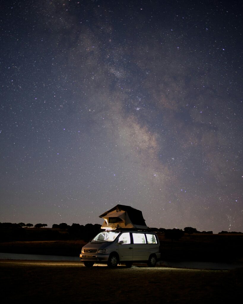 Van camping under the Milky Way in Campinho, Évora, Portugal.